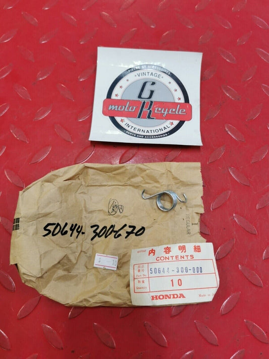 NOS Honda GL1000 SPRING L. STEP RETURN STAND 50644-300-000 50644-300-670 H32