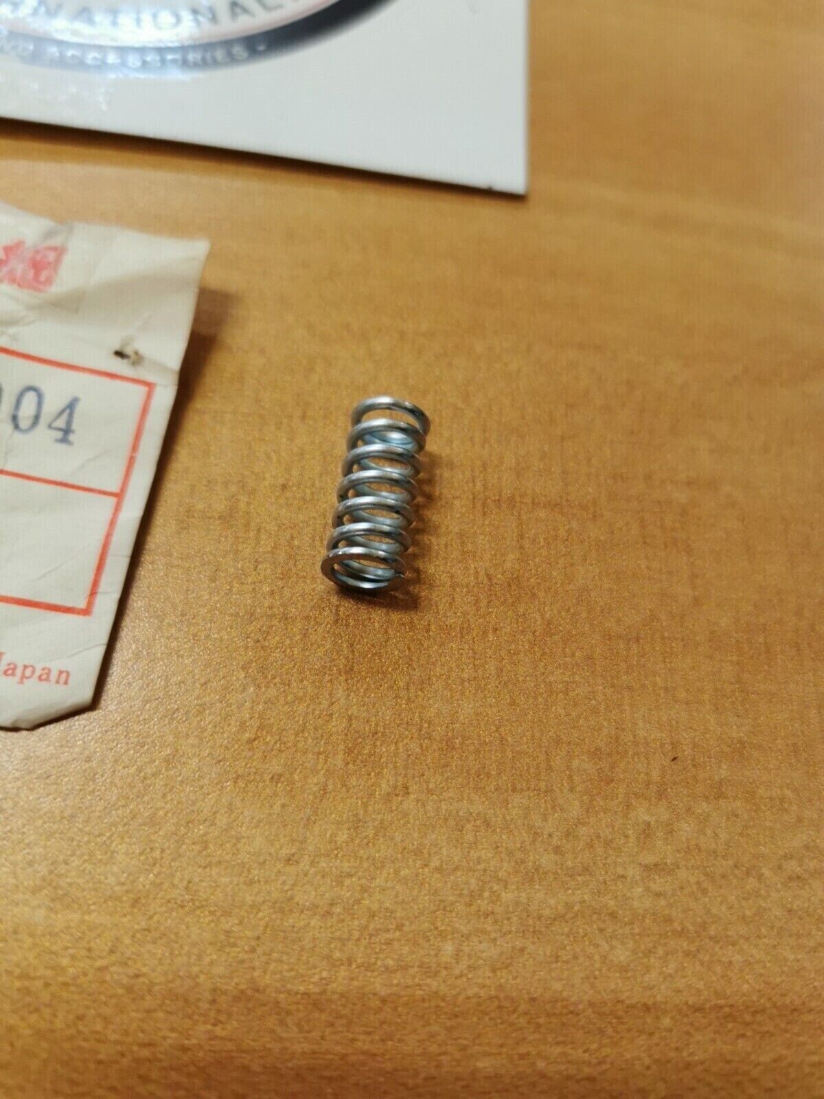 NOS Honda STOP SPRING 16126-300-004 H26