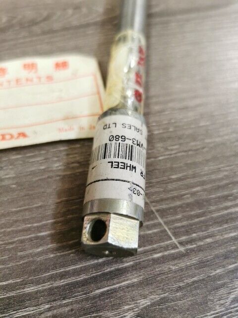 NOS HONDA ATC200M 1985 AXLE FRONT WHEEL 44301-958-010 H88