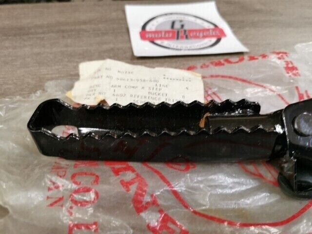 NOS HONDA ATC200E ATC200M 1982 - 1984 ARM  REAR STEP 50613-958-680 H74