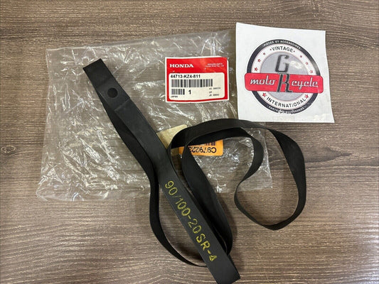 NOS Honda CR125R CR250R CRF250R CRF450R TIRE FLAP (DUNLOP) 44713-KZ4-811 H122