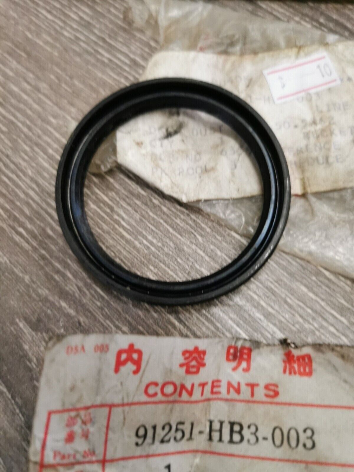 NOS HONDA TRX200SX  DUST SEAL 50.5X62X9 91251-HB3-003  H57