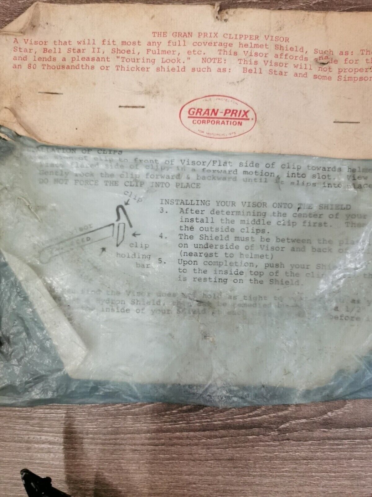 NOS GRAN-PRIX HELMET CLIPPER VISOR BENT J20