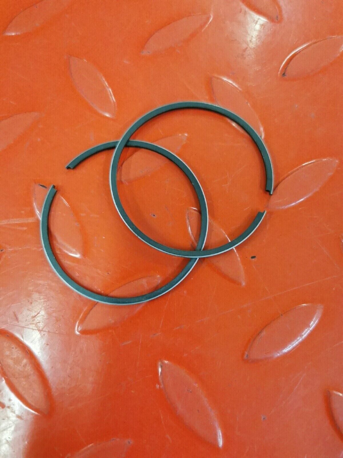 NOS SUZUKI RING SET PISTON OS 0.5 12140-36770 SUPERSEDED BY 12140-46000-050 S11