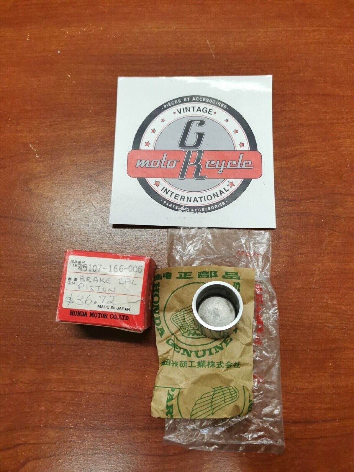 NOS Honda CR80 CRF150 CR85 BRAKE CALIPER PISTON 45107-166-006 H34