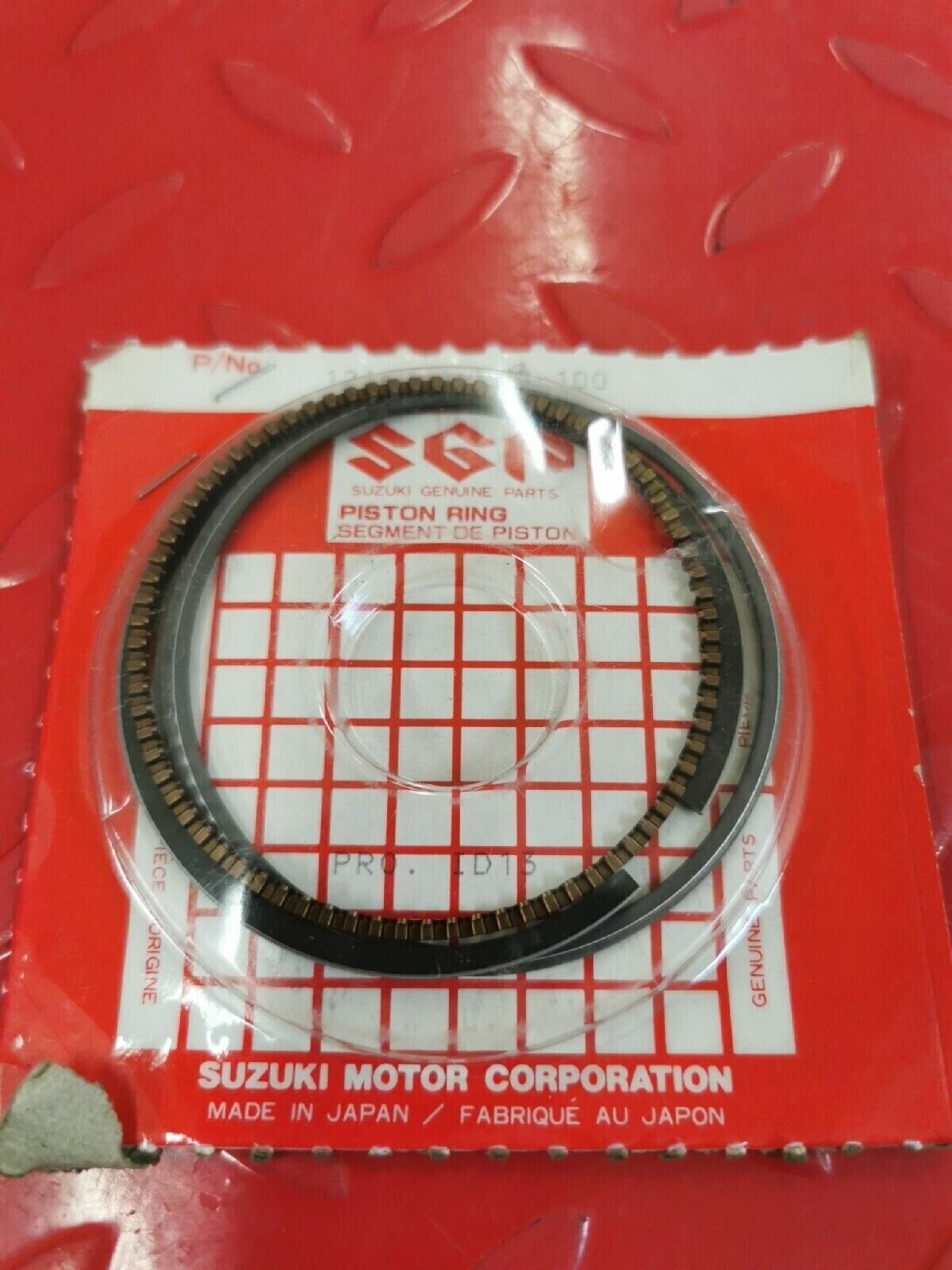 NOS SUZUKI PISTON RING SET OS 1.0 12140-19B80-100 S11