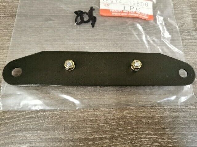 NOS SUZUKI LTF250 LTF4WDX LTF250 BRACKET REAR 35974-19B00 S41