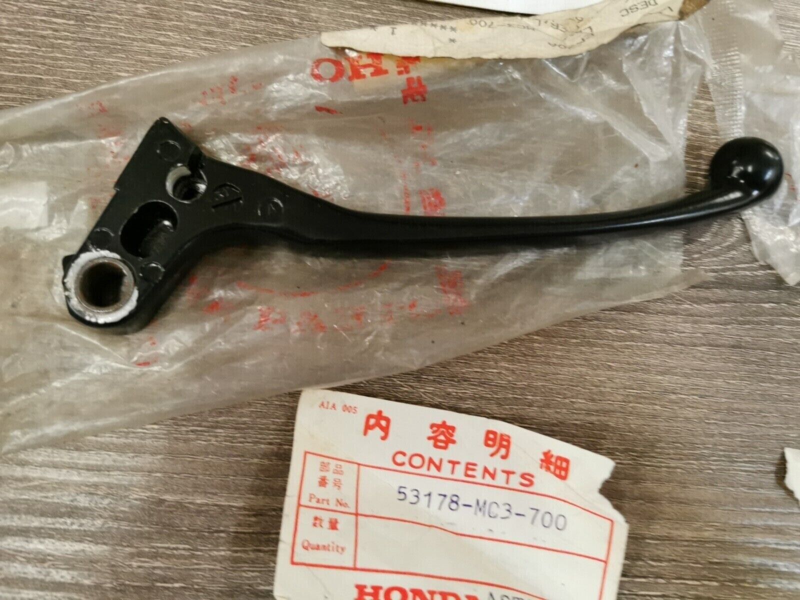 NOS HONDA CB750SC  CB650C CB1100F  LEVER  L  HANDLEBAR 53178-MC3-700  H48