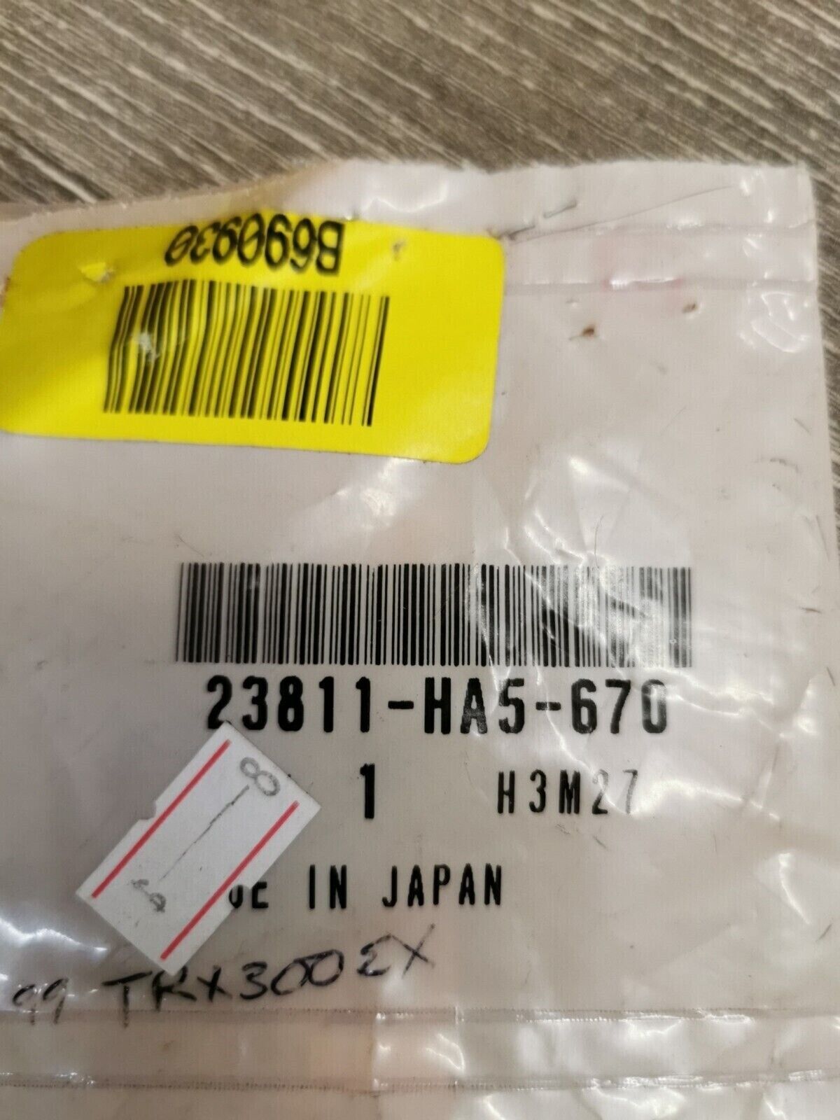 NOS HONDA FIXING PLATE 23811-HA5-670 H51