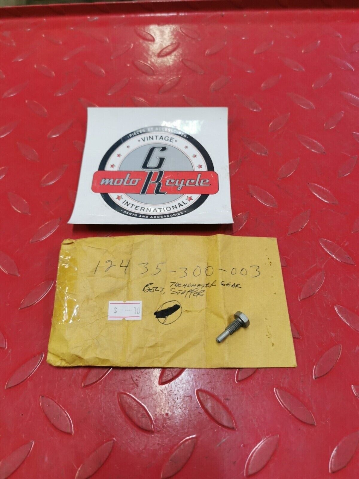 NOS Honda 1976 - 1978 CB750 BOLT, TACHOMETER GEAR STOPPER 12435-300-003 H32
