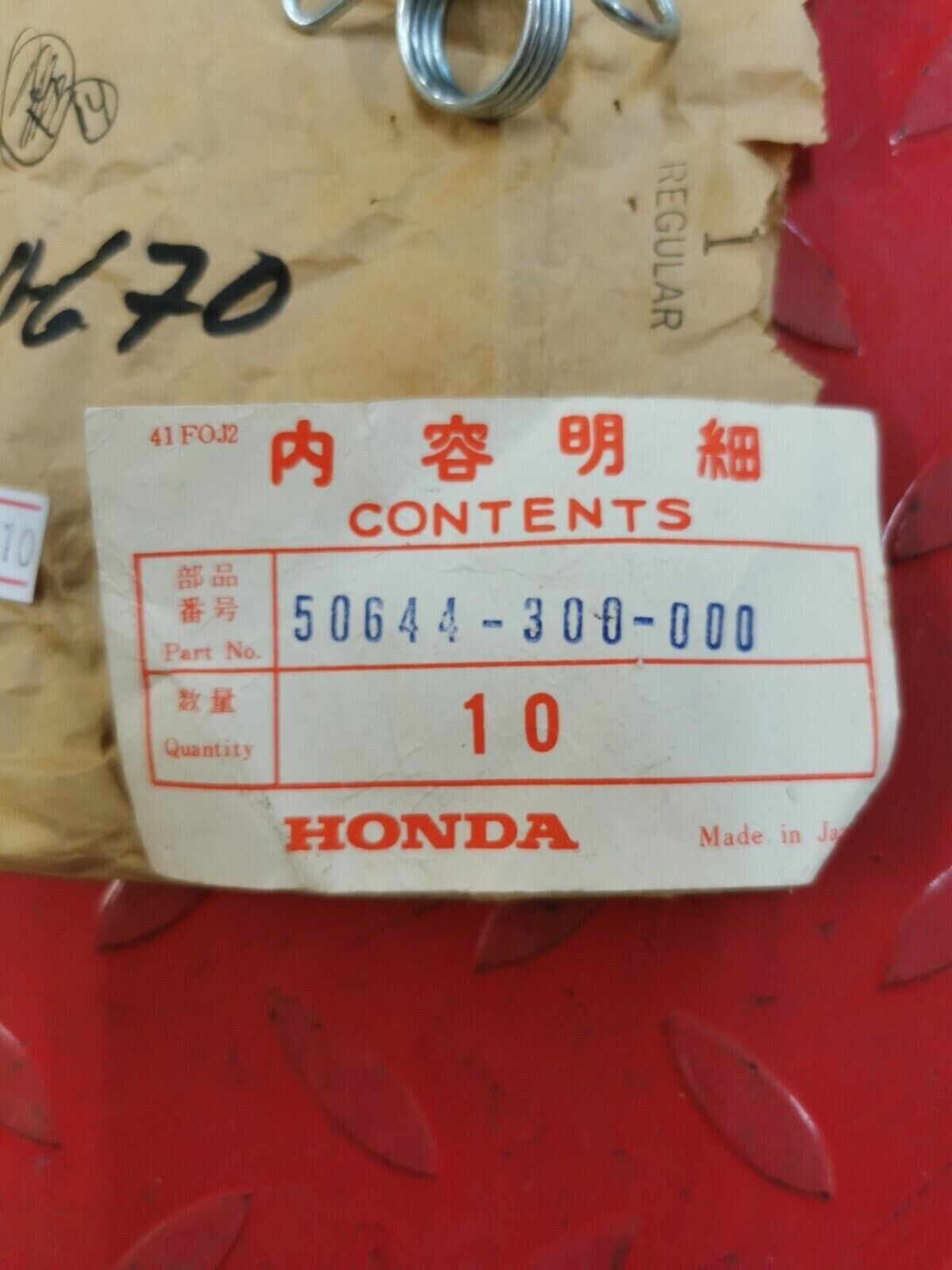 NOS Honda GL1000 SPRING L. STEP RETURN STAND 50644-300-000 50644-300-670 H32