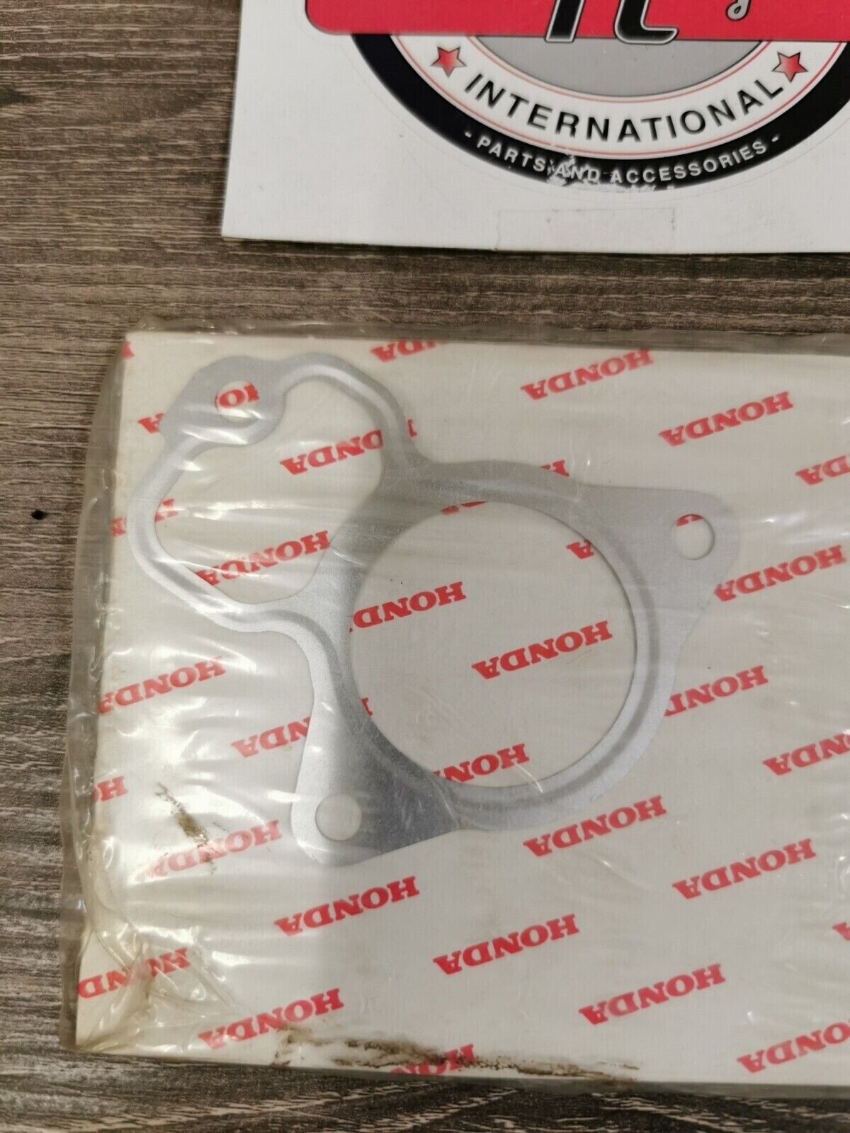 NOS HONDA CR125R 1987 1988 GASKET EX JOINT 18314-KS6-701 H49