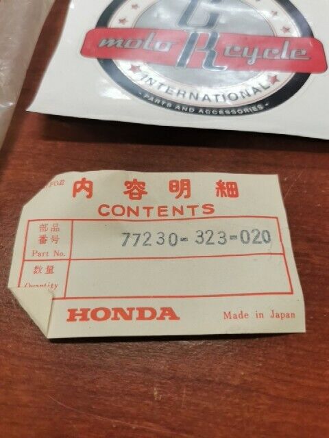 NOS Honda CB500 K0 SEAT CATCH 77230-323-020 H78