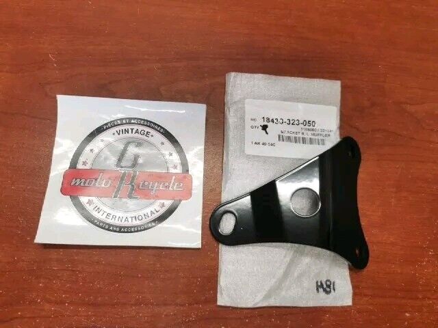 NOS HONDA CB500 LEFT MUFFLER BRACKET B 18430-323-050 SUB 18430-323-040 H81