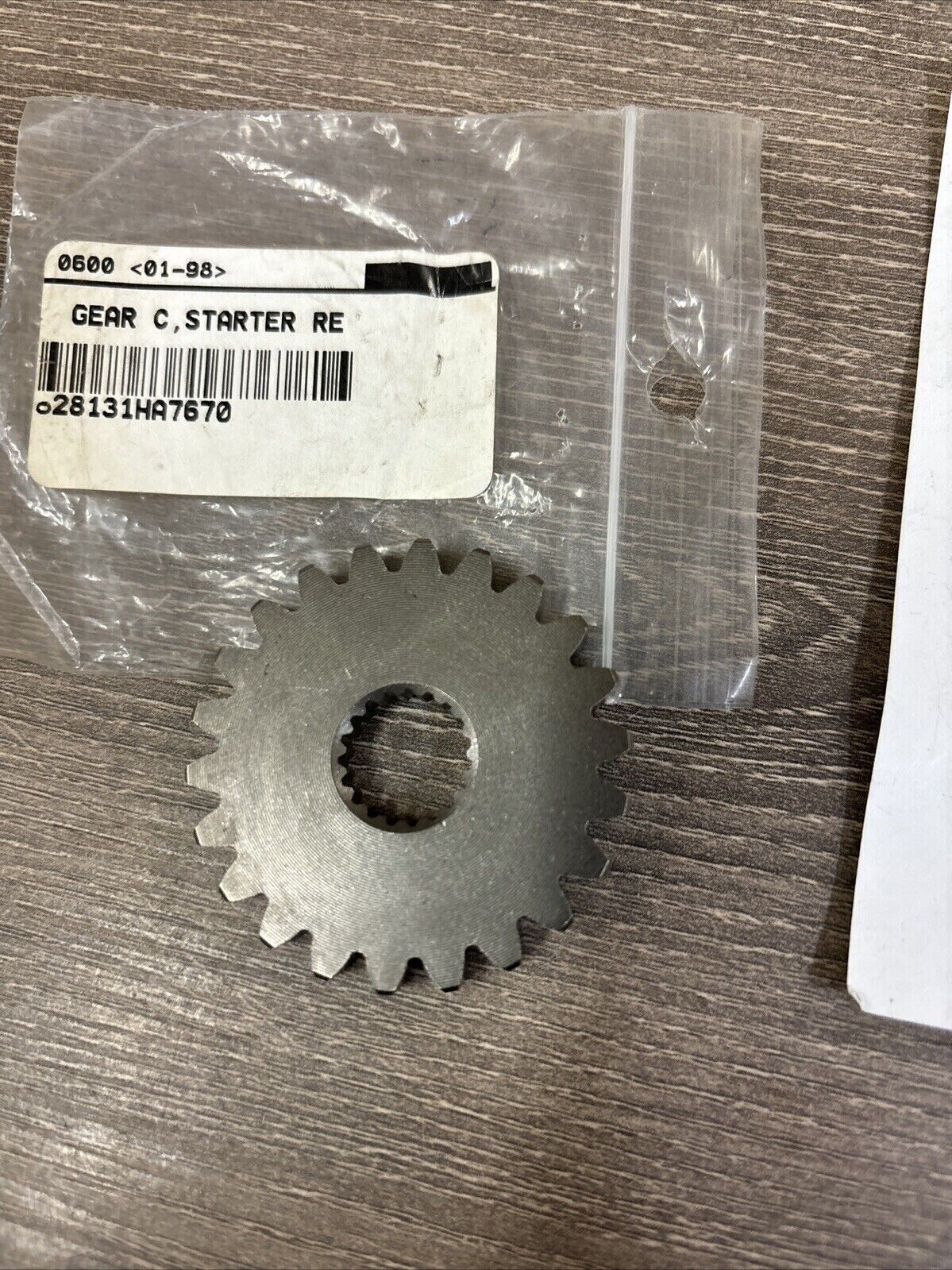 NOS Honda 1986 TRX350 STARTER REDUCTION GEAR C 22T 28131-HA7-670 H118