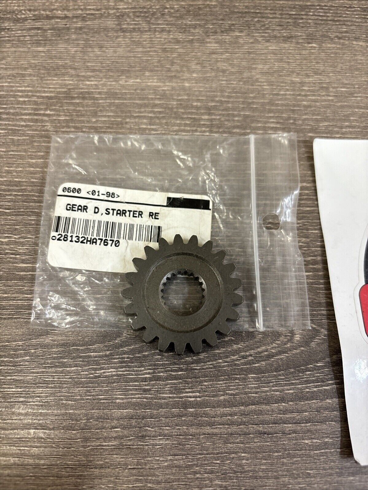NOS Honda 1986 TRX350 STARTER REDUCTION GEAR D 21T 28132-HA7-670 H118