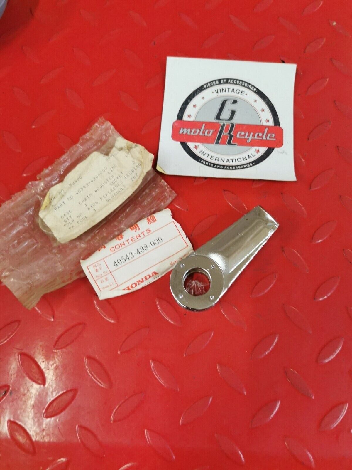 NOS HONDA  CB750F CB900F 1979 - 1982 ADJUSTER DRIVE CHAIN 40543-438-000 H38