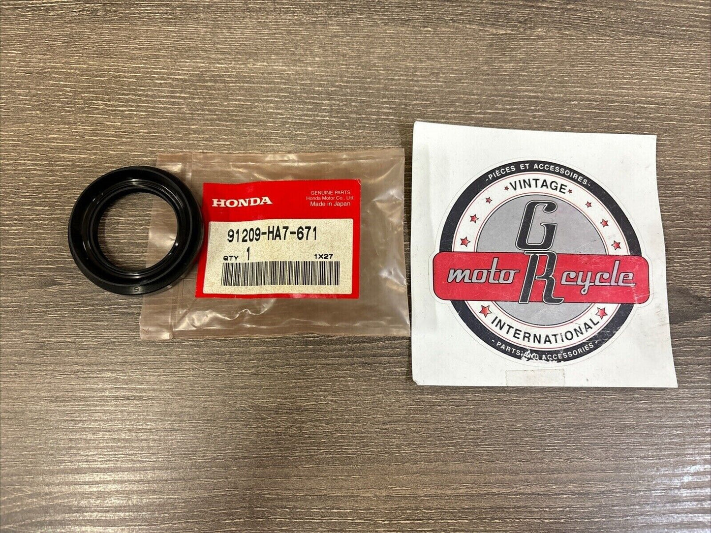 NOS Honda 1986 TRX350 DUST SEAL 36X56X7 91209-HA7-671 H128