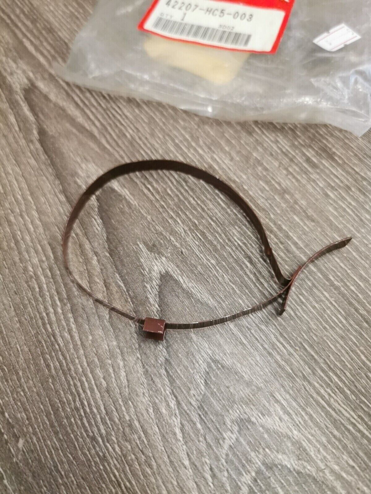 NOS HONDA TRX300FW BAND 42207-HC5-003 H58