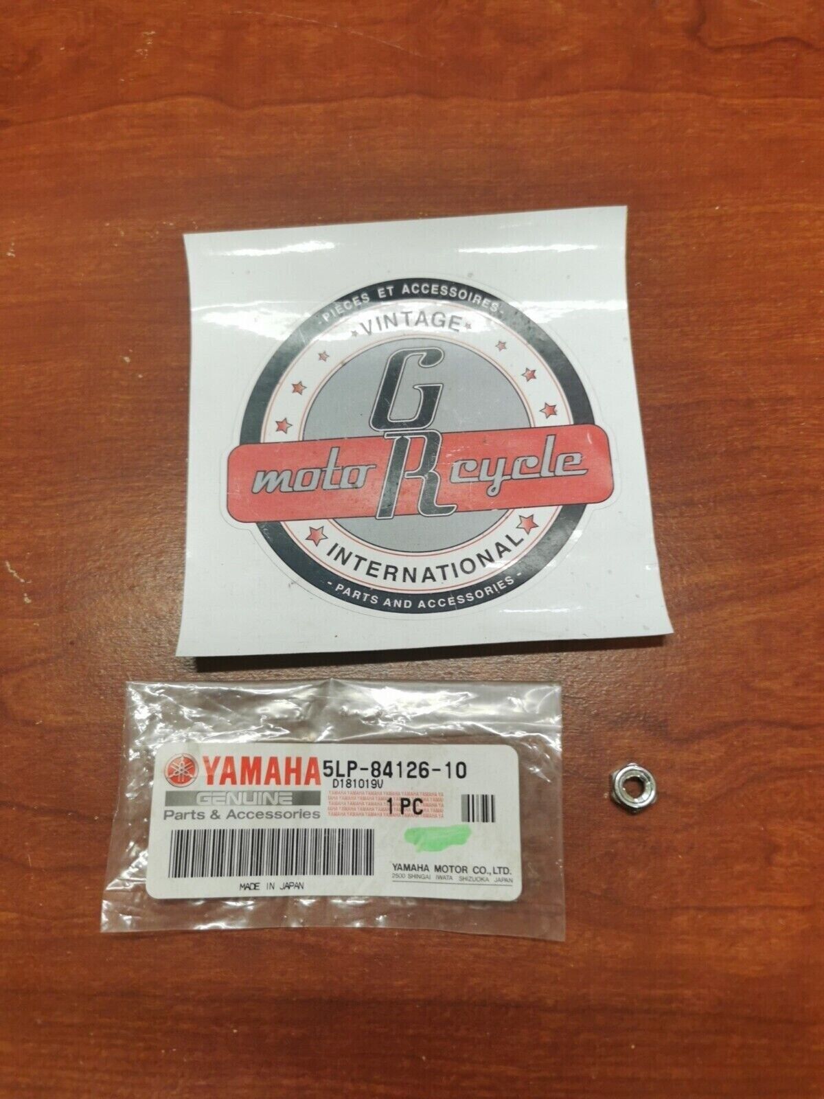 NOS Yamaha YZ450 YZ250 YZ125 YFS200 WR250 LENS FITTING NUT 5LP-84126-10-00 Y82