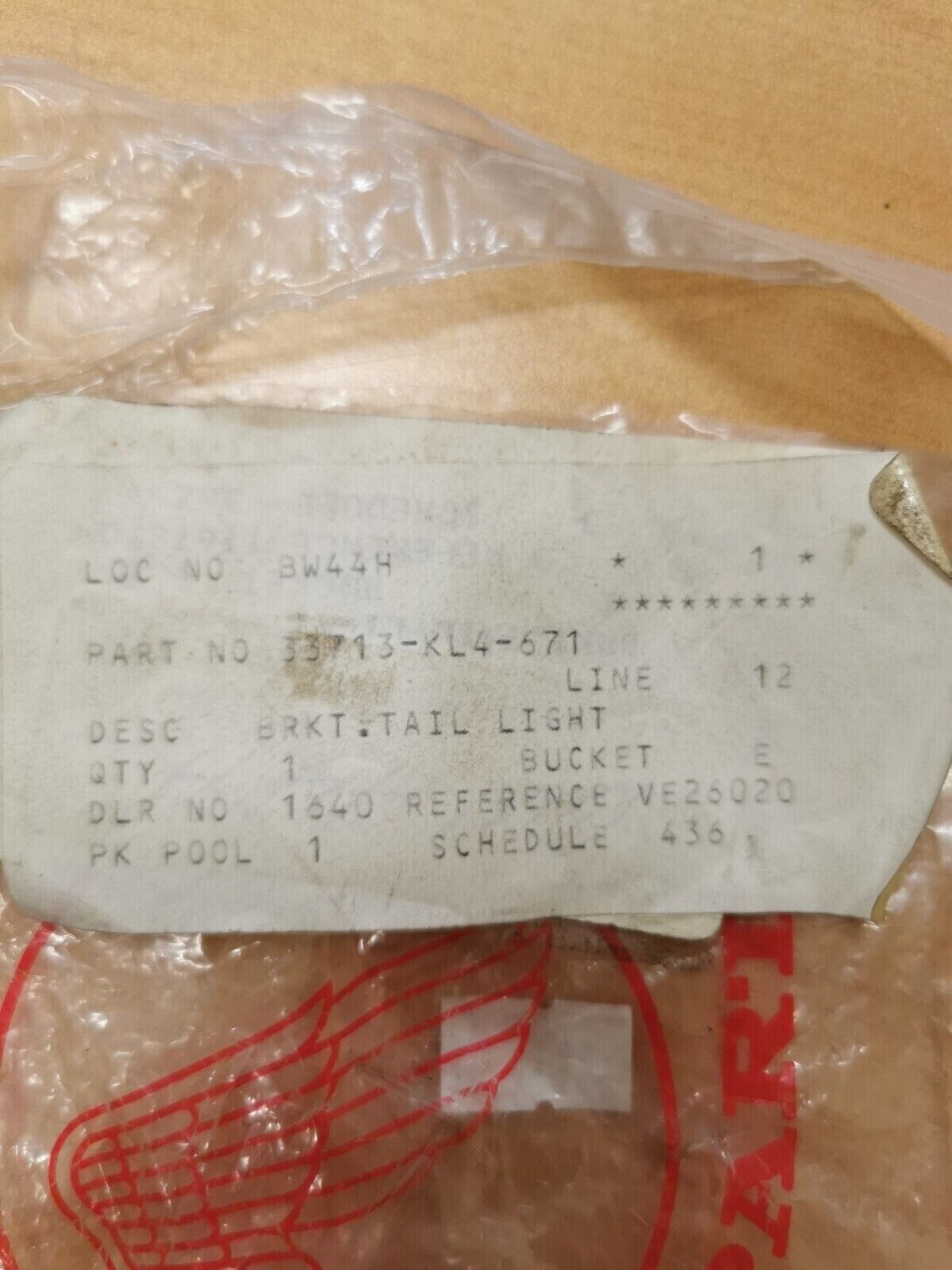 NOS HONDA XL250 1984 - 1987 BRACKET  TAILLIGHT  33713-KL4-671 H17