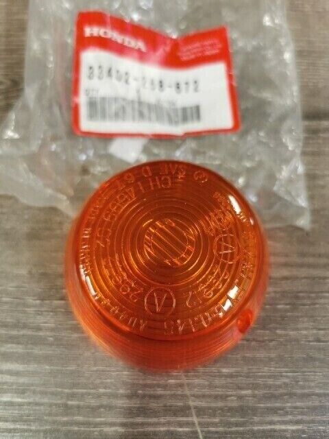 NEW NOS HONDA C70 C70M CB100 CB125S 1968 - 1979 LENS WINKER 33402-268-672 H102