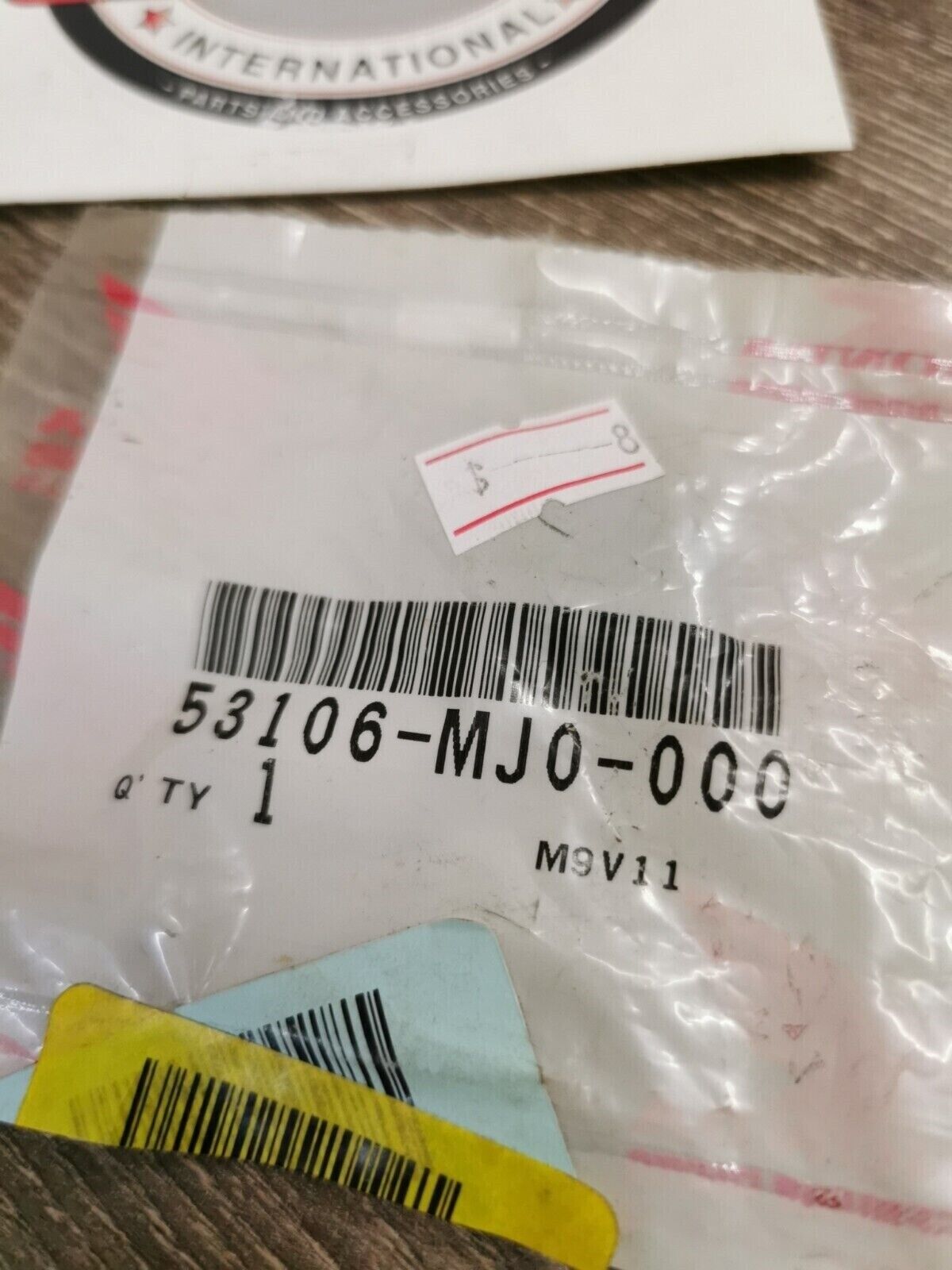 NOS HONDA  RUBBER 53106-MJ0-000 H54
