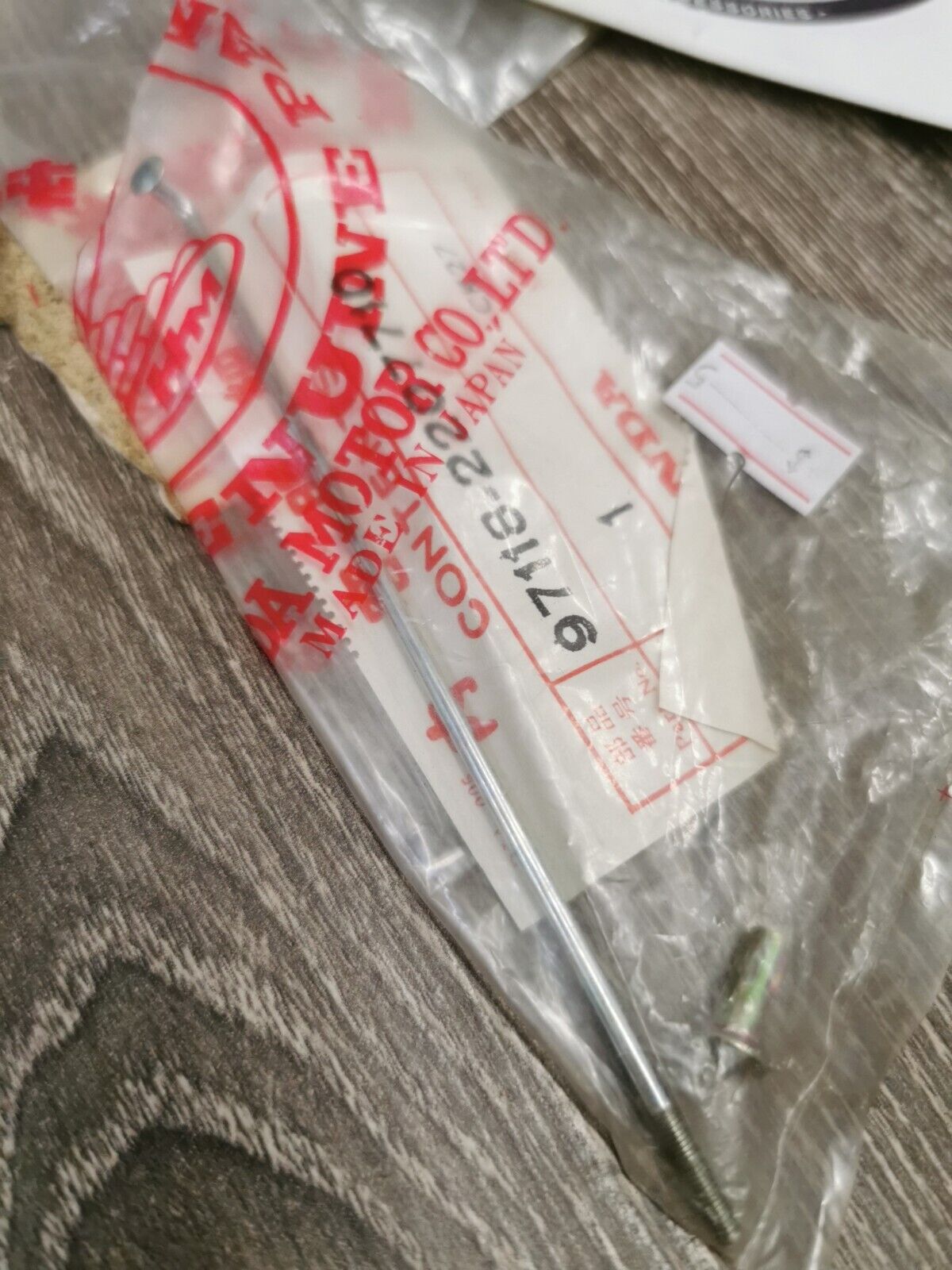 NOS HONDA SPOKE MR50 97118-2207710 97118-22077-10  H57