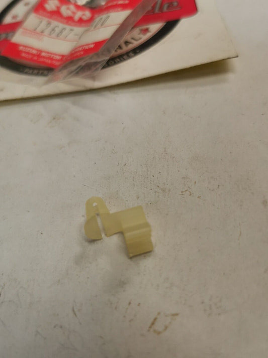 NOS SUZUKI  RM125 RM250S RM80 LT250R EXHAUST VALVE BUSHING 12687-01B00 S28
