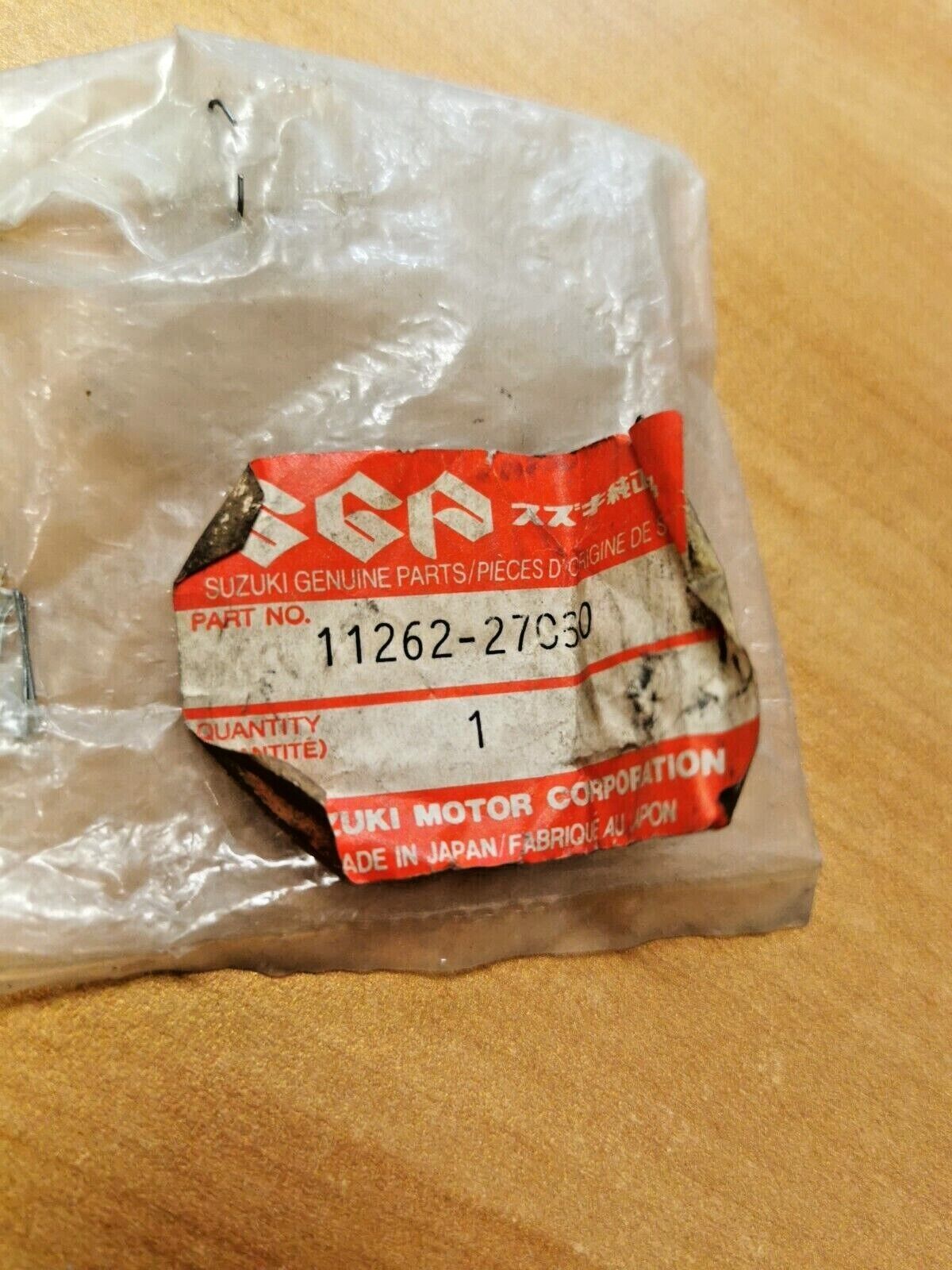 NOS SUZUKI RM125M  RM125S 1989 - 1995  EXHAUST VALVE GUIDE 11262-27C30    S6
