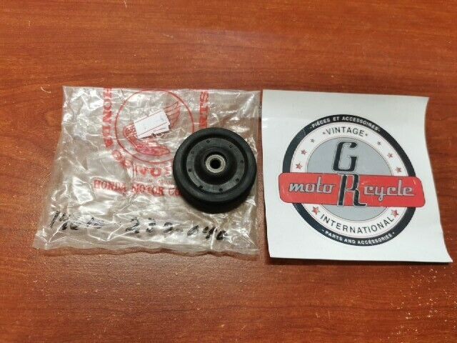 NOS Honda CB125 CD125K CL125 SS125A CAM CHAIN GUIDE ROLLER 14610-230-040 H93