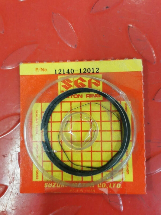 NOS SUZUKI PISTON RING SET 12140-12012 S11
