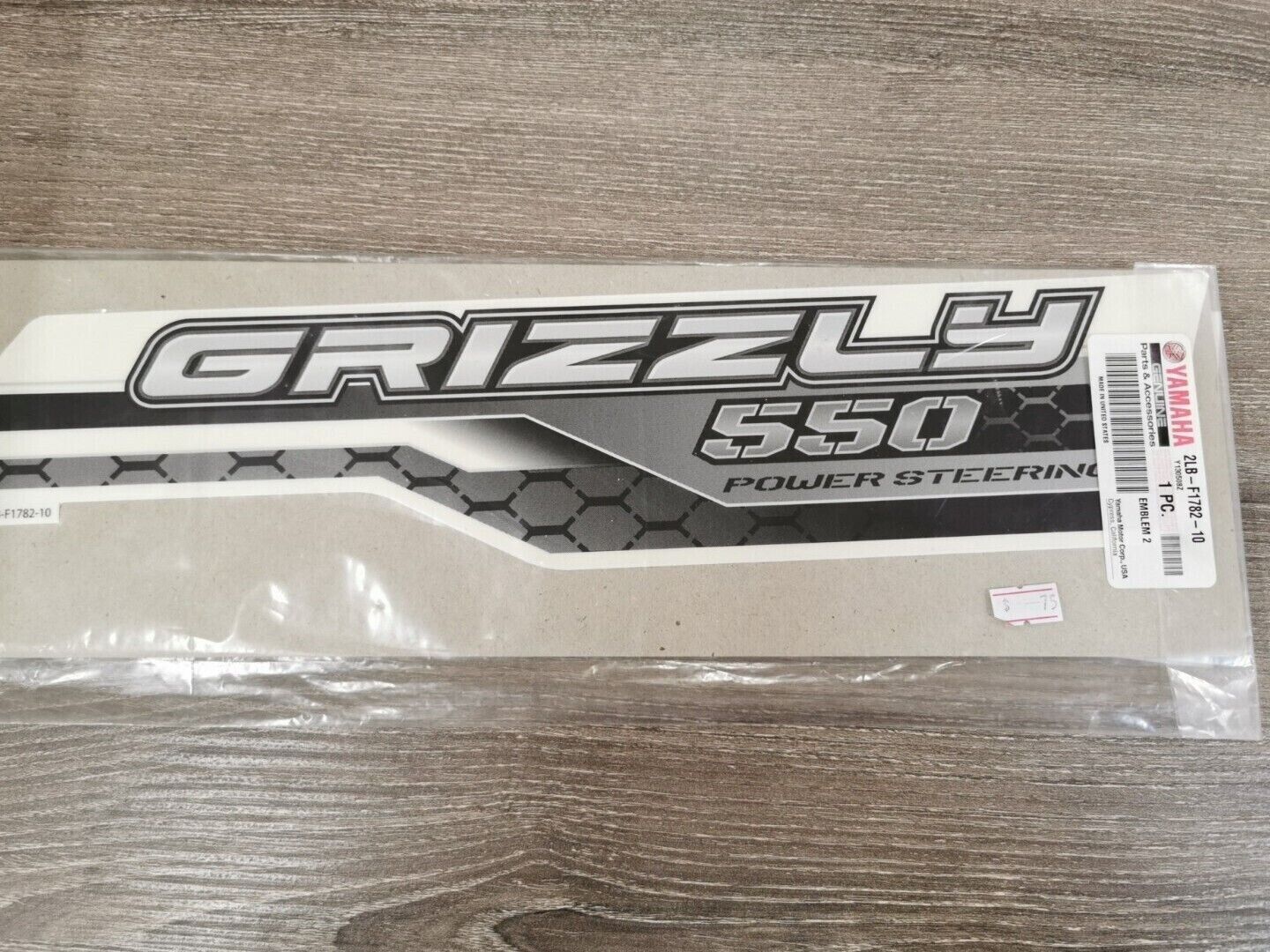 NOS YAMAHA GRIZZLY 550 EMLEM 2  2LB-F1782-10-00  Y49