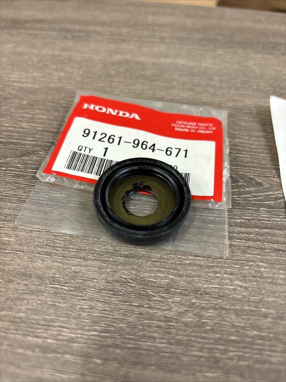 NOS Honda CR125R CR250R NX125 XR200R CUSHION ARM PIVOT SEAL 91261-964-671 H126