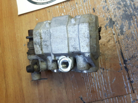 Suzuki RM250 1990 front brake caliper