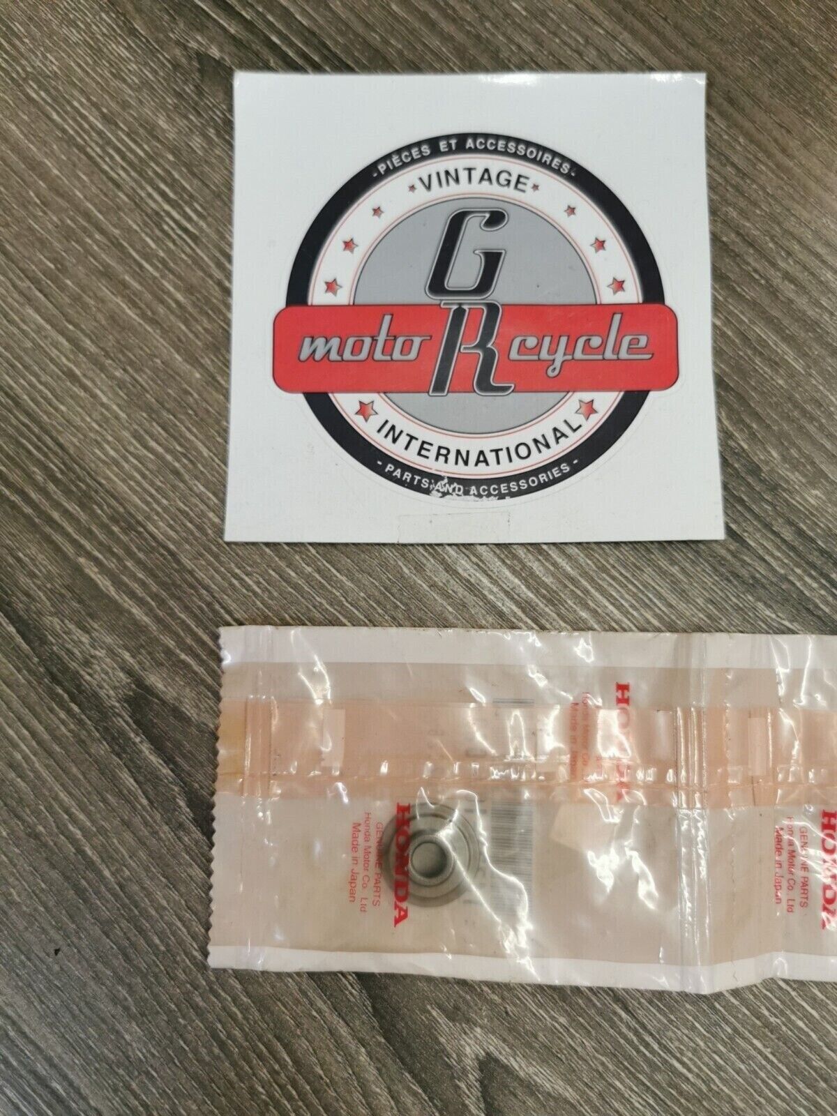 NOS HONDA  VALVE SPRING RETAINER 14771-107-020 H55