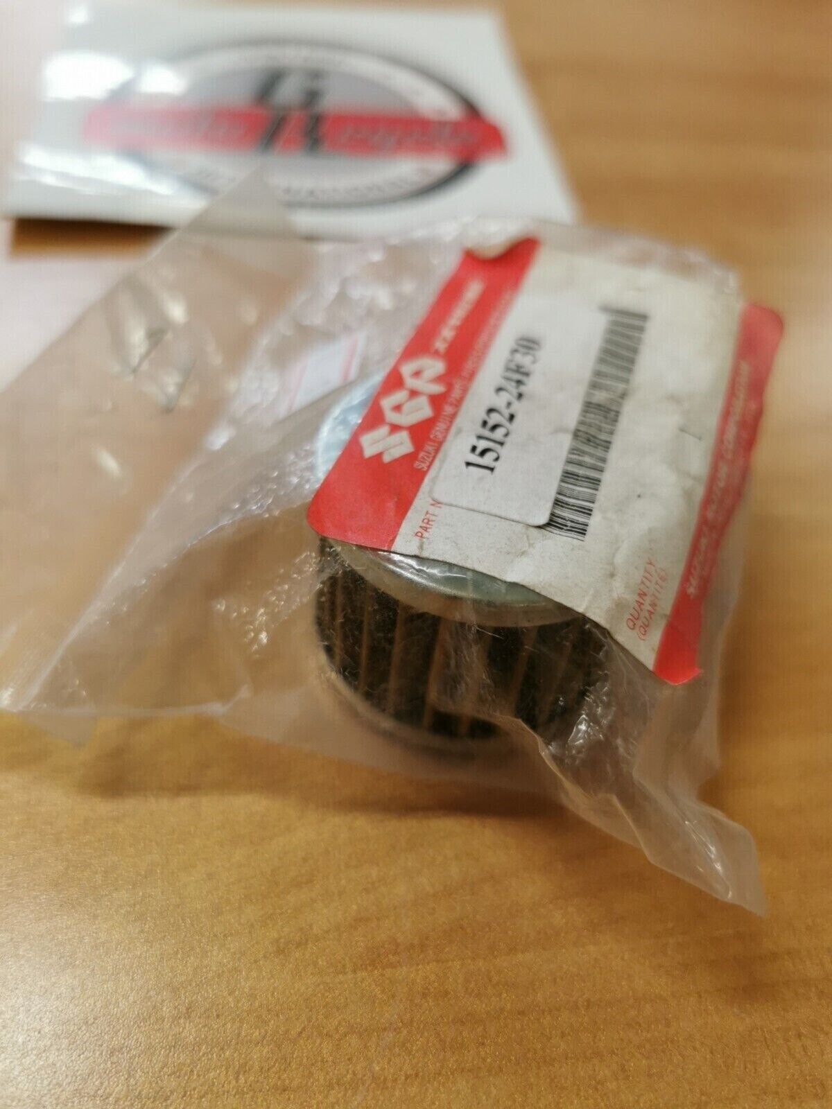 NEW NOS  SUZUKI 1999 2000    FUEL STRAINER SPRING 15152-24F30  S10