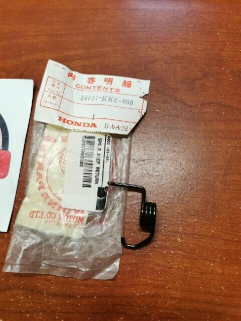 NOS Honda 1984 XL250R XR200R XR250R R. STEP RETURN SPRING 50617-KK0-000 H152
