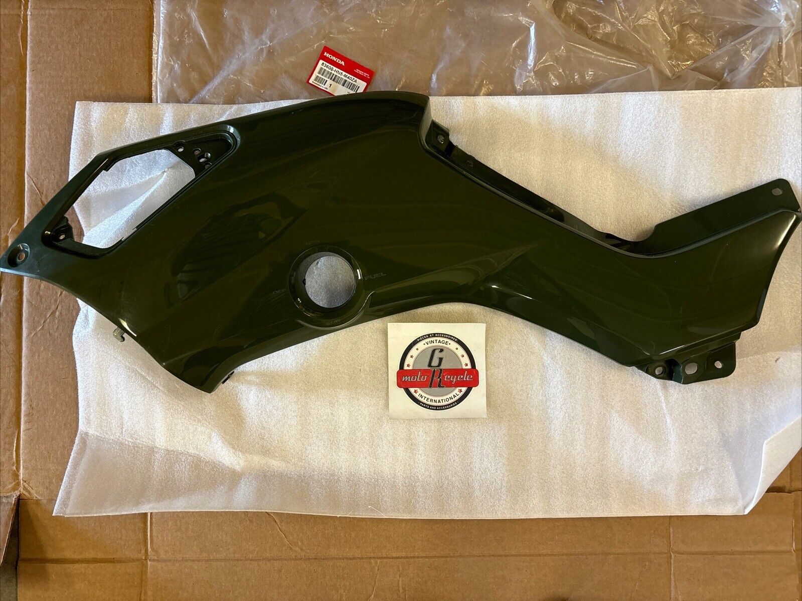 NOS HONDA 2004 - 2006 TRX350 LEFT TANK SIDE COVER 83600-HN5-M40ZA