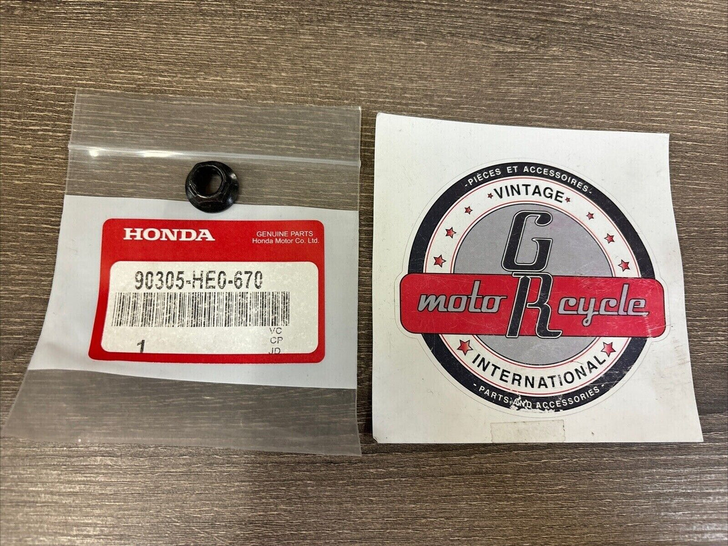 NOS Honda 1990 FL400R SELF-LOCK NUT 10MM 90305-HE0-670 H125