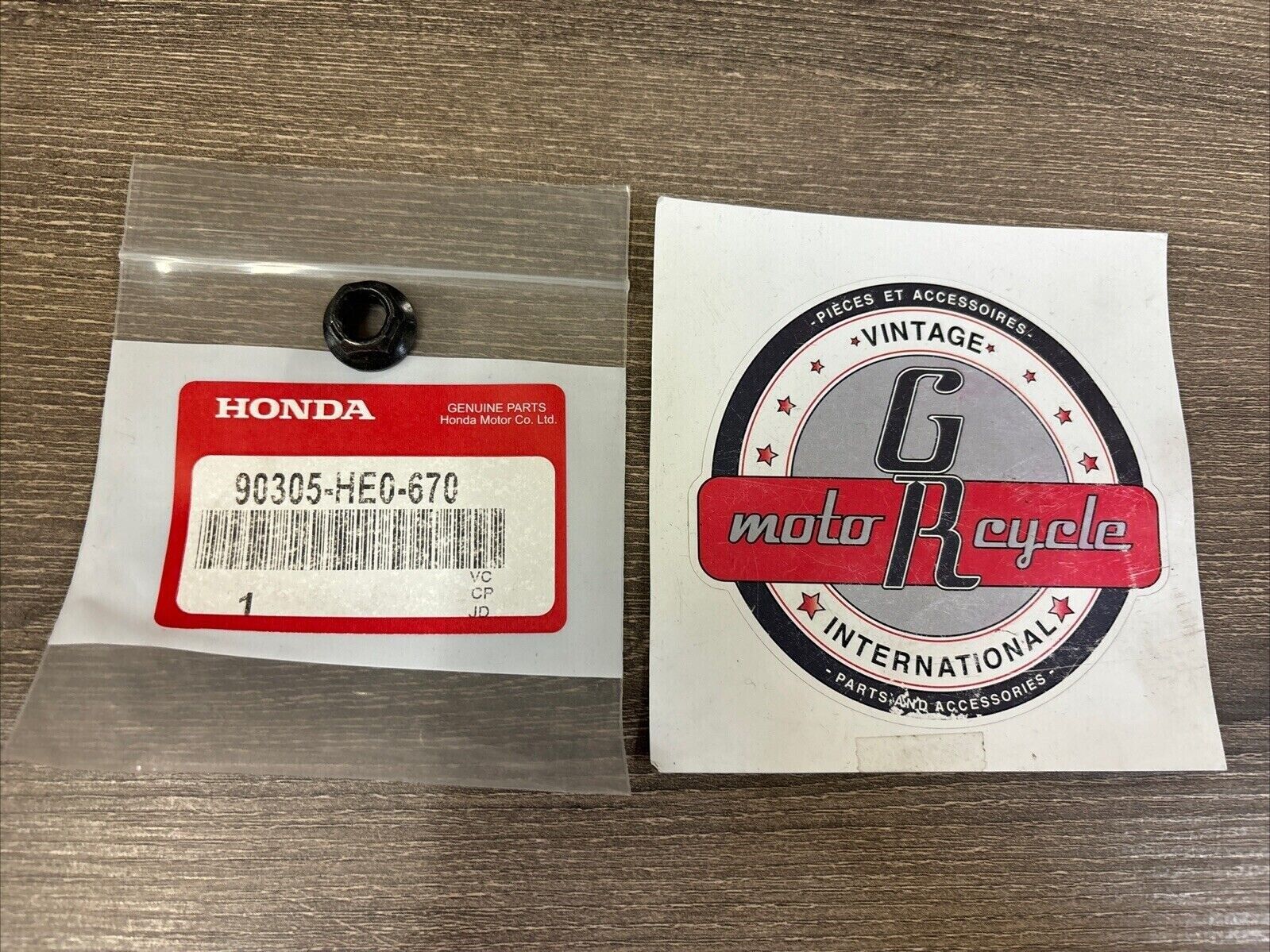 NOS Honda 1990 FL400R SELF-LOCK NUT 10MM 90305-HE0-670 H125