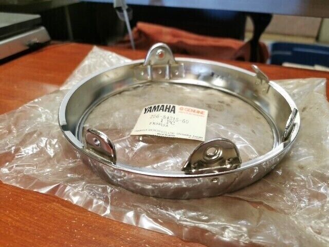 NOS Yamaha TX650 XS1 XS2 HEAD LAMP RIM 256-84315-60-00 Y130