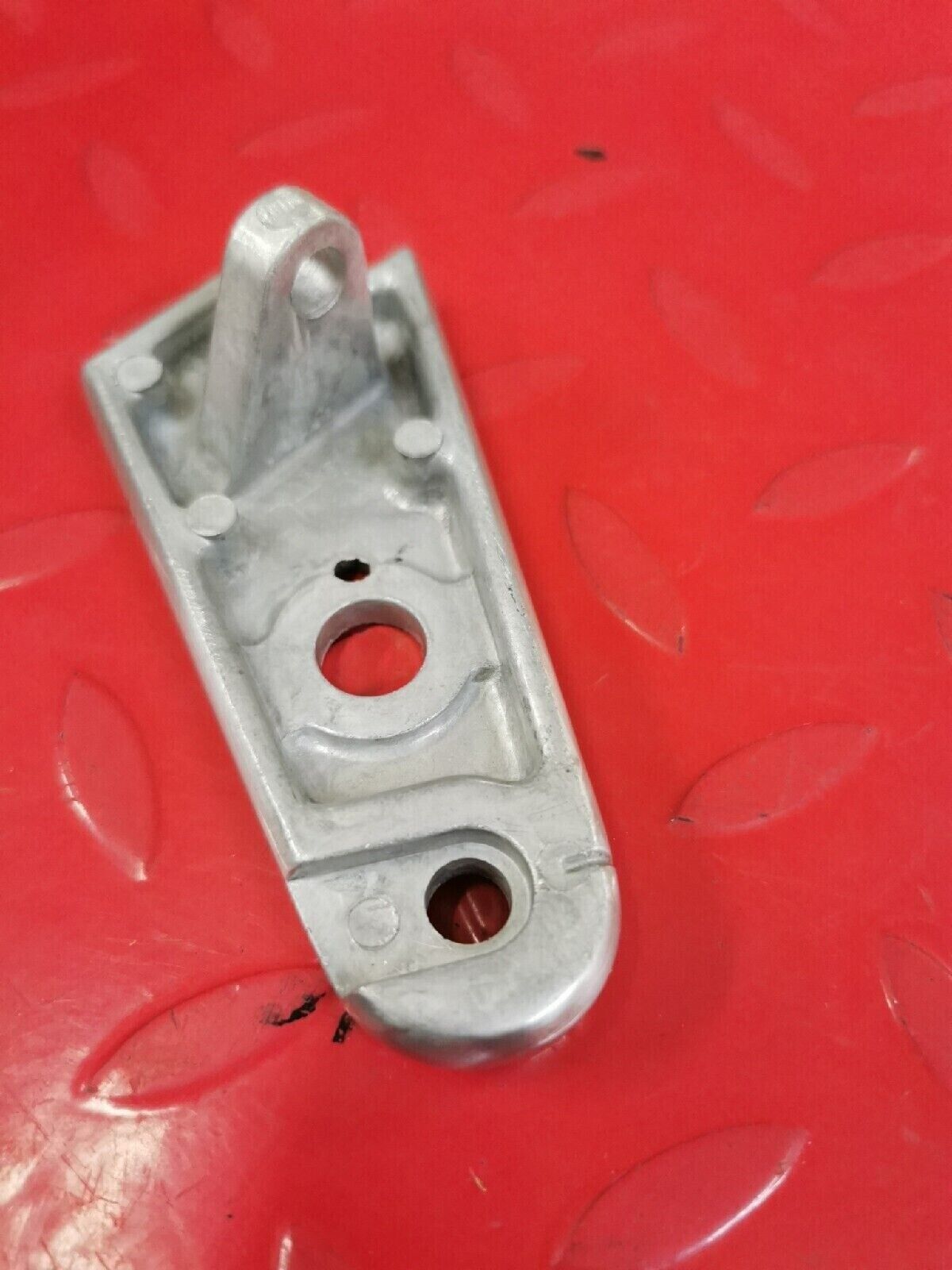 NOS HONDA  VT500C  1983 1984 STAY L  HEADLIGHT  61313-MF5-000 H39