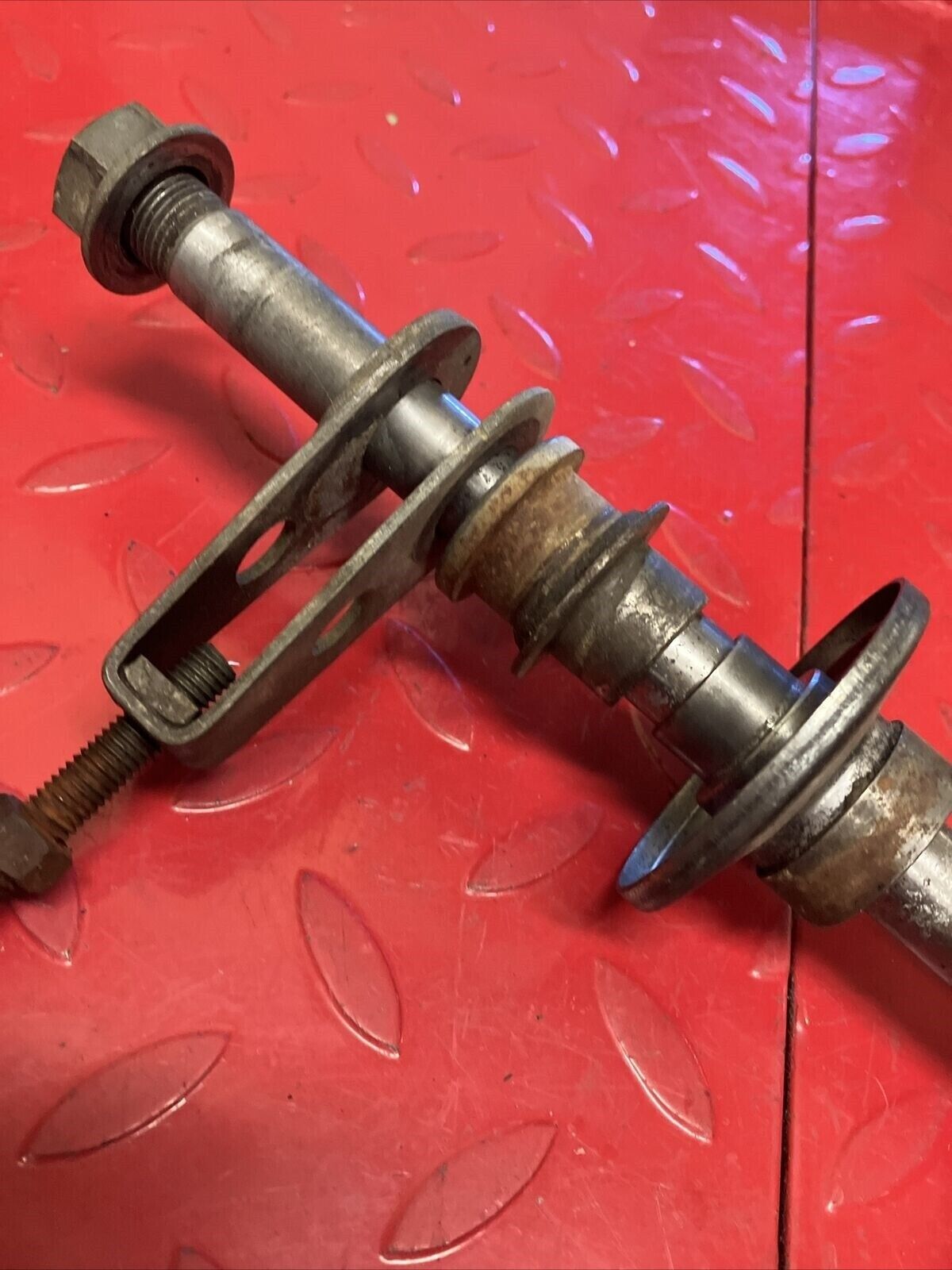 Kawasaki KX125 1980 rear wheel axle bolt shaft spacer collar chain adjuster