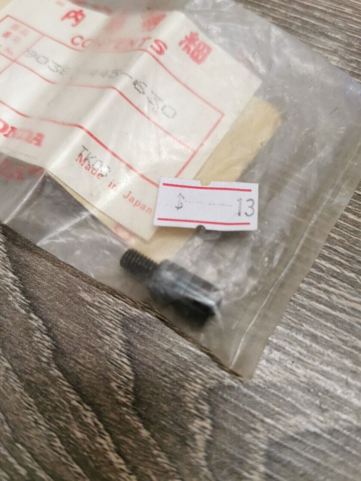 NOS HONDA SCREW OVAL 5X8 90380-445-630 H51