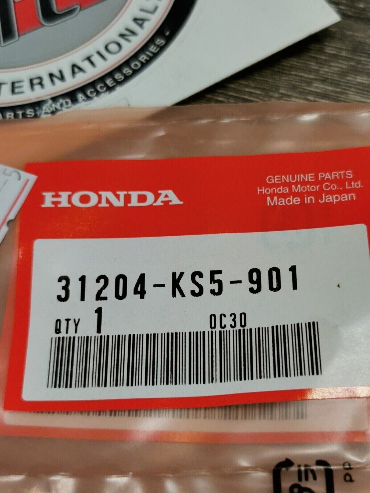 NOS HONDA  CARBON BRUSH SPRING 31204-KS5-901 H53