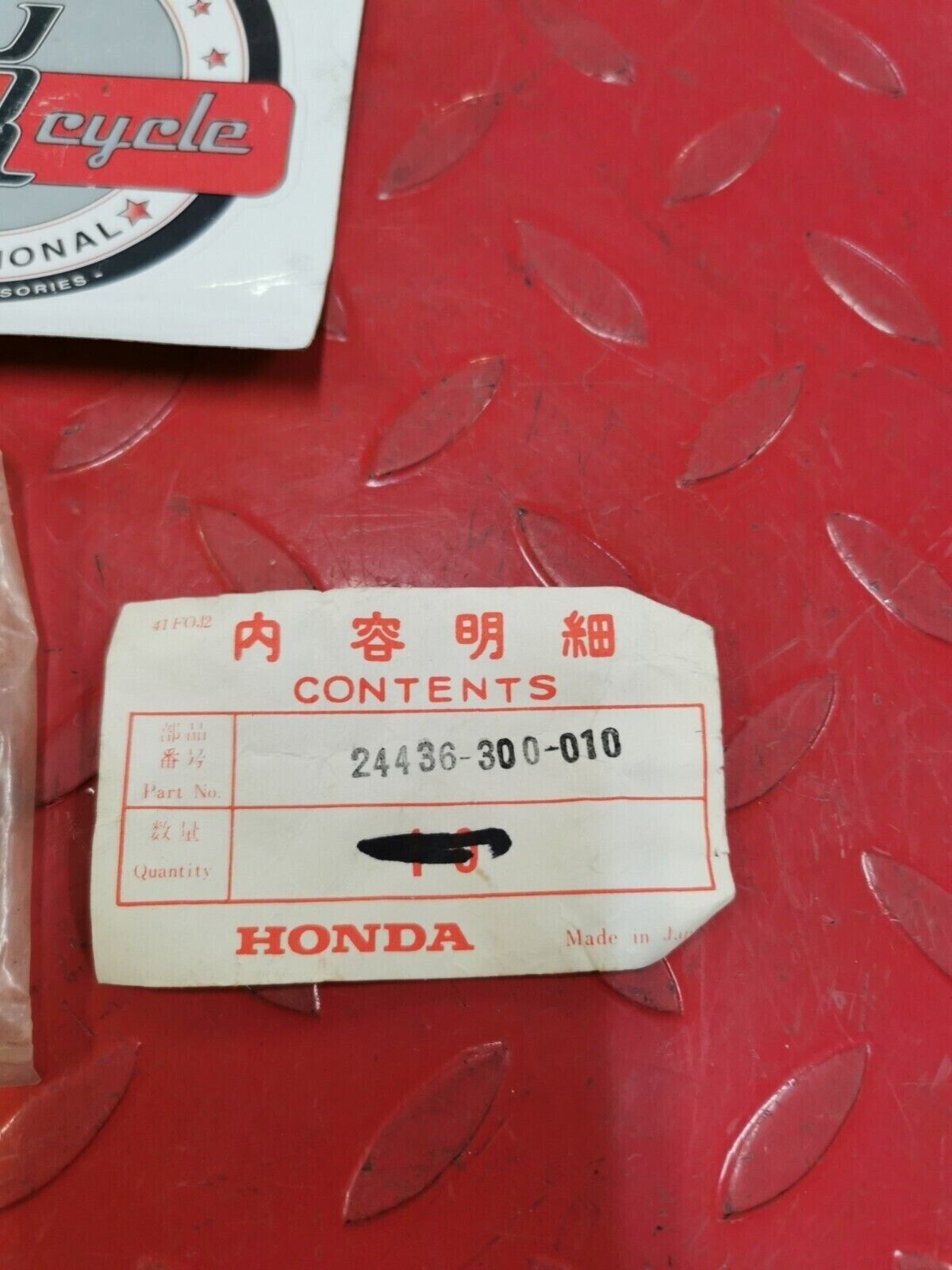 NOS Honda 1976 CB750K PLATE, GEARSHIFT FORK SHAFT STOPPER 24436-300-010 H32