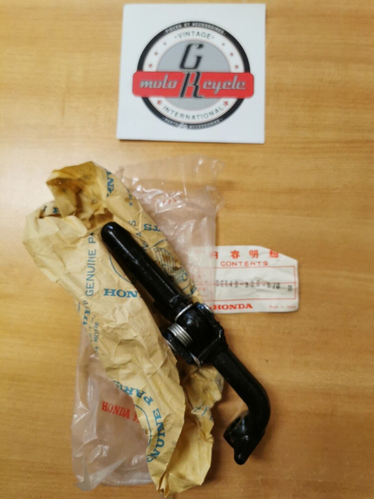 NOS HONDA CB750 STEP ASSY LEFT 50640-300-670B H20