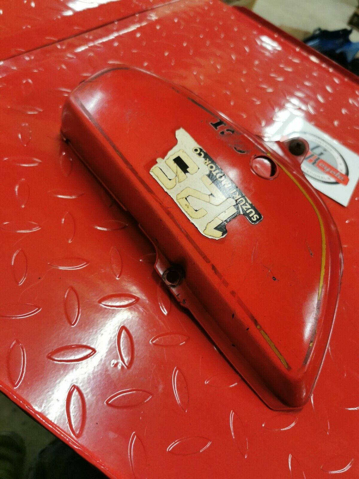 Suzuki TC125 1976 left side cover panel fairing