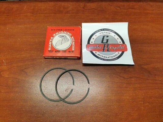 NOS Honda 1973 CR250M PISTON RING SET (OS 0.25) 13012-357-003 H75